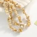 Macro detail of irregular natural stone beads with organic earthy textures for jewelry DIY - Approx 270 Pcs/Strand / Beige Brown Texture (0801)