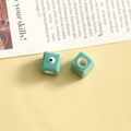 Detail of light green square evil eye glass beads for DIY jewelry and hair accessories - Lake Green Square / 1 Piece