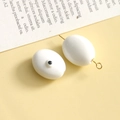 Dettaglio di perle di vetro occhio 3D bianche per gioielli con perni in metallo dorato - Bianco Ovale / 1 Pezzo