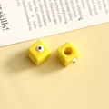 Dettaglio di perline quadrate gialle con motivo a occhio per gioielli fai da te - Quadrato Giallo / 1 Pezzo