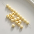 Macro detail of 8mm cream yellow macaron acrylic beads for DIY jewelry making - 1 Piece/Pack (8mm) / Yellow