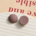 Detail of matte purple resin earrings on white ceramic dish with a retro aesthetic - Round Purple
