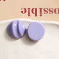 Detail of chic lavender resin buttons with ribbed and smooth finishes for DIY crafts - Light Purple