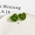 Macro detail of heart-shaped frosted green glass beads with pink spiral for DIY jewelry - Heart (27#)