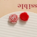 Macro detail of resin rose charms showing 3D petal front and flat back for DIY crafts - Red
