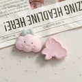 Detail of pink flocked cloud charms with cute smile and soft texture for DIY jewelry making - Cloud