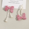 Elegant pink velvet bow earrings with pearl tassels and gold-tone hooks - Pink
