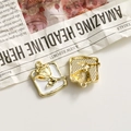 Detail of rose embossed square charms showing front design and back grid texture - White Square Gold Rose