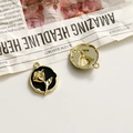 Detail of vintage round rose charms with gold plating and black enamel for DIY jewelry - Black Round Gold Rose
