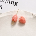 Detailed macro of pink tulip-shaped resin jewelry charms with gold metal attachment hooks - Tulip Bud (62#) / 1 Piece / Peach Pink