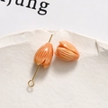 Macro shot of tulip-shaped beads in pastel pink for DIY earring and jewelry making - Tulip Bud (63#) / 1 Piece / Orange