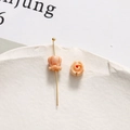 Detailansicht der 6mm rosa Maiglöckchen Perlen für die DIY-Schmuckherstellung im Makrostil - Hellorange