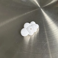 Macro shot of cloud-shaped white acrylic pendant bead with smooth glossy finish and center hole - Cloud Shape / Solid White Cloud