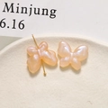 Macro shot of peach pink iridescent butterfly acrylic beads with golden metal jewelry pin - 1 Piece / Orange