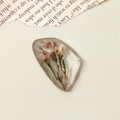 Detailed view of faceted resin pendant with embedded real dried flowers for DIY jewelry - Dried Flower Patch (One Piece)