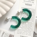 Detail of translucent dark green resin C-shape earrings with white pearl accents - Green C-Shape One Piece