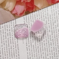 Detail of square pink and white resin charms with shell glitter for DIY jewelry making - Pink Purple