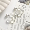 Detailed view of translucent wave-shaped resin earrings with elegant faux pearl backing - Transparent White Flower One Piece