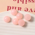 Detail of 14mm pink pearlescent resin half-round beads for DIY jewelry making - Pink