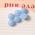 Macro shot of 14mm light blue jelly resin half-beads for DIY jewelry and hair accessories - Blue
