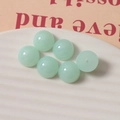 Detail of 14mm light green translucent resin beads for DIY jewelry and hair accessories - Green