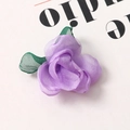 Detail of handmade purple organza rose with green leaves for DIY hair accessories - Purple