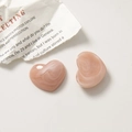 Close-up of pink ink-wash marble texture resin heart-shaped jewelry accessories - Pink