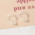 Détail de maillons torsadés en acrylique givré blanc cassé pour création de bijoux - Blanc Cassé (5035847707157)