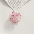 Detailed macro view of a pink sheer mesh flower petal with soft polka dots and beaded core - Pink Polka Dot