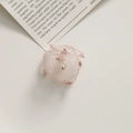 Macro detail of a soft pink organza woven petal handmade hair clip or earring accessory - Light Pink