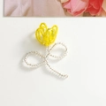 Detail of yellow and clear beaded tulip charm for DIY jewelry and hair accessories - Yellow