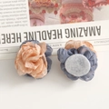 Detail of pink and blue organza fabric rose petals showing the felt base for DIY crafts - Handmade Rose / Pink