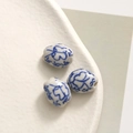 Close-up of hand-painted blue and white porcelain beads for DIY jewelry making - No. 1 (45# No. 1, 1PC)