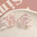 Close-up of pink translucent iridescent resin flower accessories for DIY jewelry making - 1 Piece / Phantom Pink