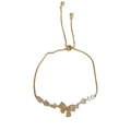 Elegant adjustable gold bow bracelet with micro-pave zircons for stylish women - Gold