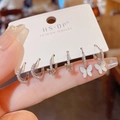 Detailopname van een zesdelige zilveren oorbellen set met kristallen en vlinders - Vlinder Stijl (Nr. 63) / 3 paar set / Zilver