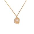 Collier élégant en perle d'eau douce plaqué or avec pendentif double boucle en zircon - Cuivre / Or