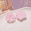 Macro shot of pink resin gardenia flower charms showing front and flat back details - Pink