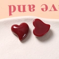 Close-up of deep red glossy heart-shaped resin charms for DIY jewelry and hair accessories - Wine Red One