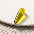 Olive green teardrop resin pendant accessory with transparent finish for DIY crafts - Brown