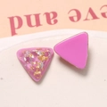 Macro detail of triangle resin charms with gold foil flakes and purple enamel finish - Rose Red
