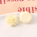 Detailed macro view of 20mm matte beige resin rose charms with front and back DIY structure - Milk White