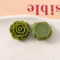Detailed close-up of 20mm green matte resin rose charms with flat back for DIY crafts - Grass Green