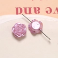 Macro view of purple pearlescent rose beads showing fine relief and perforation detail - 1 Piece / Rose Red
