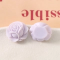 Macro detail of light purple acrylic rose charms showing front texture and flat back - Taro Purple