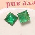 Macro shot of square green resin charms with gold silk thread inclusions for DIY jewelry - 1 Piece / Green