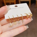 Zesdelige set gouden oorringen met vlinder- en esdoornbladmotief en zirkonia-accenten - Vlinder Esdoornblad Smiley Set (42) / Goud