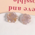 Macro shot of handmade translucent purple resin rose charms with elegant gold foil flakes - Light Purple