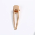 Minimalist golden alloy teardrop-shaped duckbill hair clip with polished finish - Duckbill Hair Clips / Gold