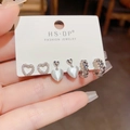 Set van drie paar zilveren oorbellen met hartvormige kattenoogstenen en golvende ringen - Hart Kattenoog Metalen Creole (Nr. 59) / Zilver